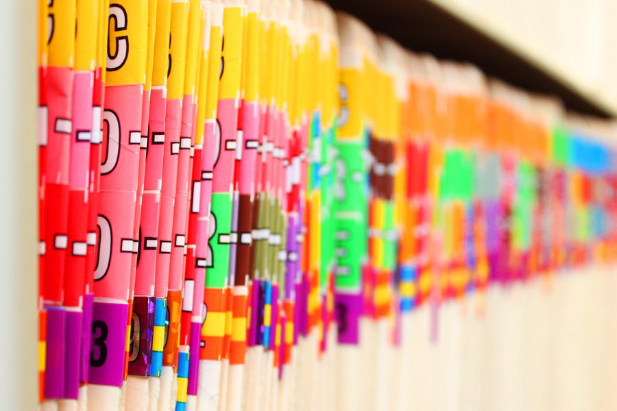 Medical files sorted on a shelf