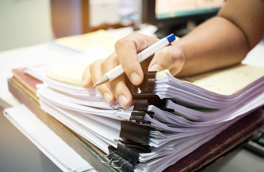 Worker browsing through documents